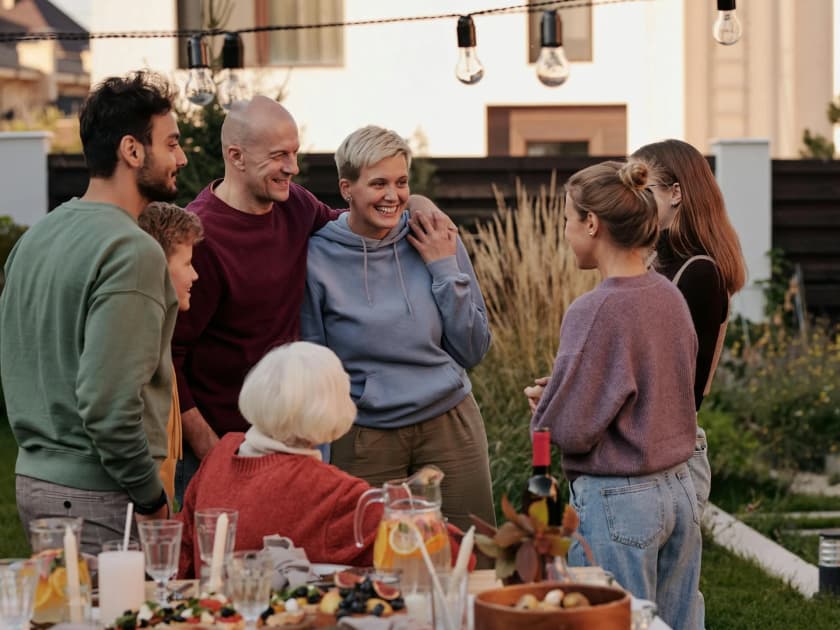 A family gathering in an outdoor setting