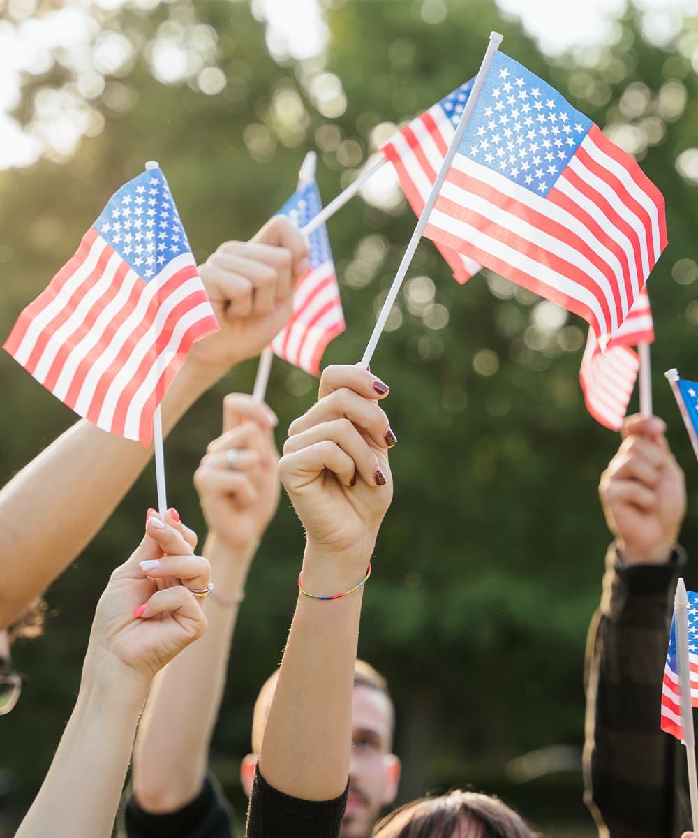 Group of Americans waving their personal flags